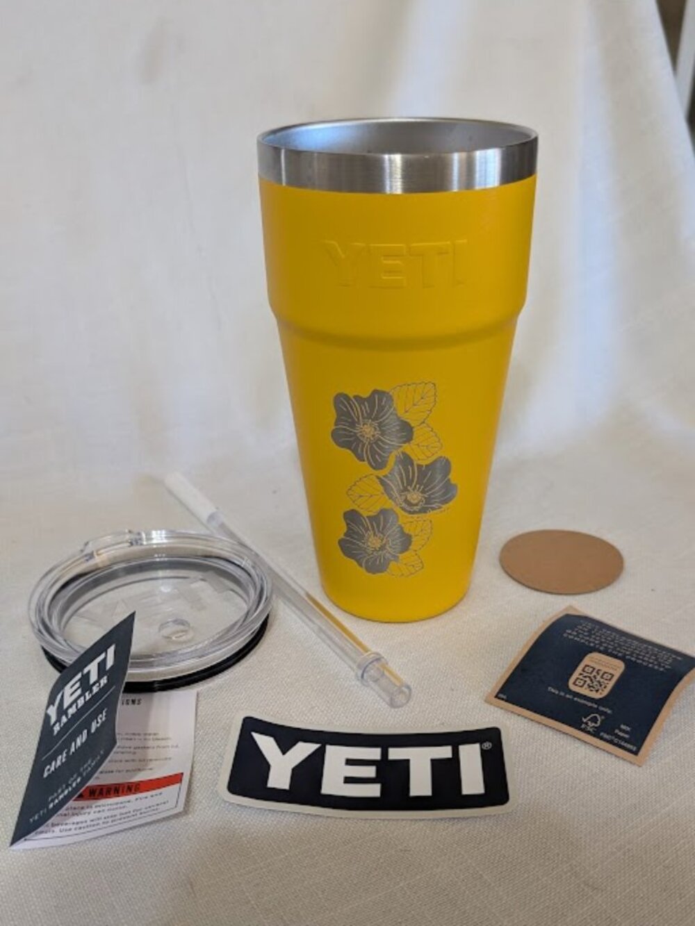 YETI Rambler 26 oz. Stackable Cup with a straw lid, in the color Alpine Yellow